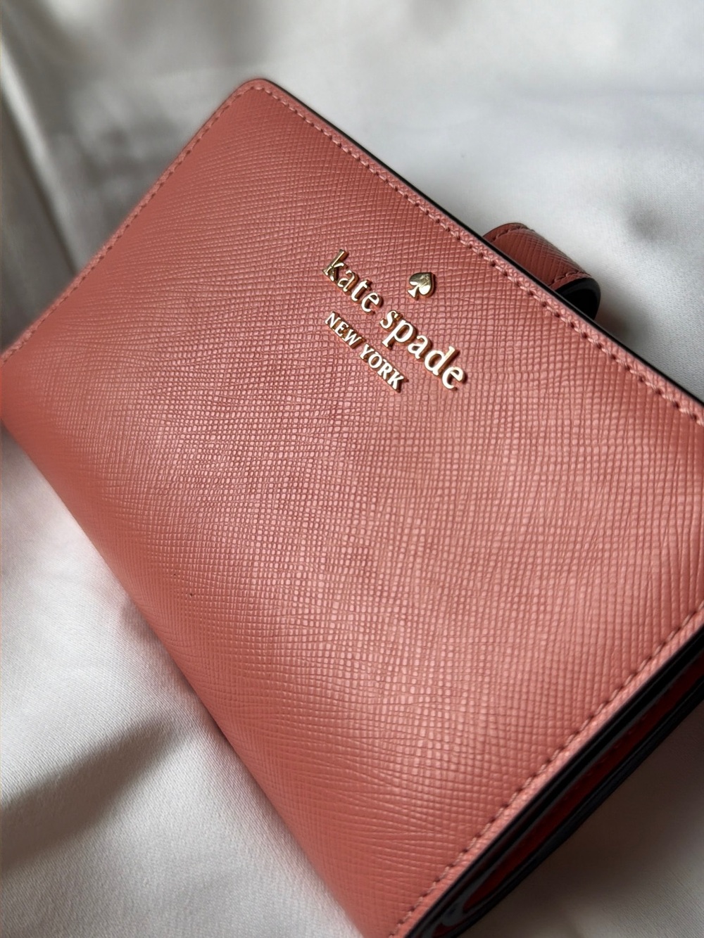 kate spade Coral Pink Saffiano Zip Wallet with Gold Logo
